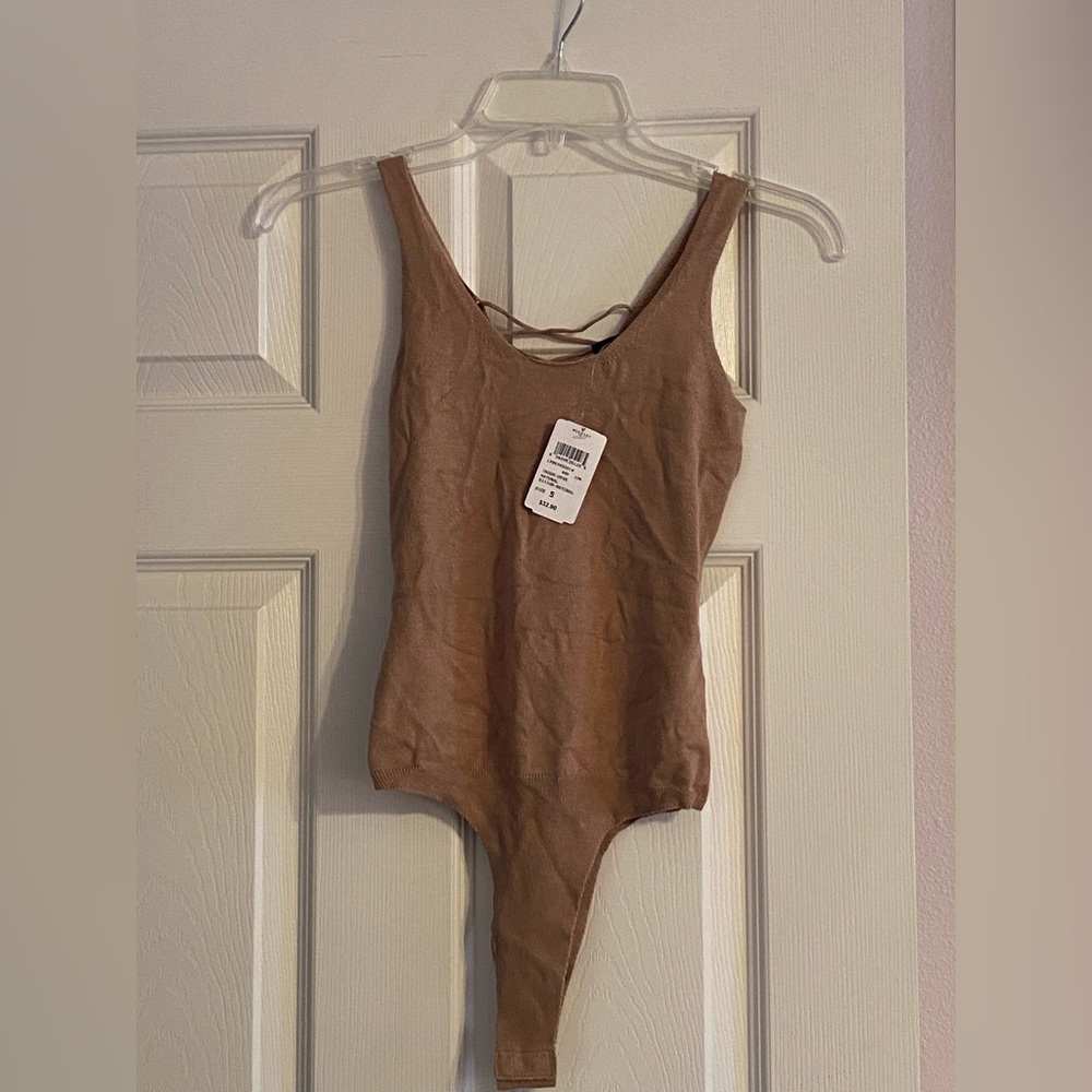 Nude colored body suit - brand new!!